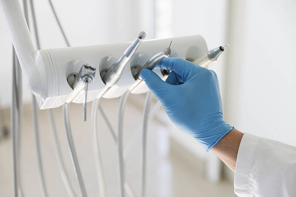 Professional Tooth Extraction technician working in Sanilac County County, MI